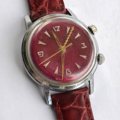 Фото часов будильник Сигнал 18 камней СССР красный циферблат хром